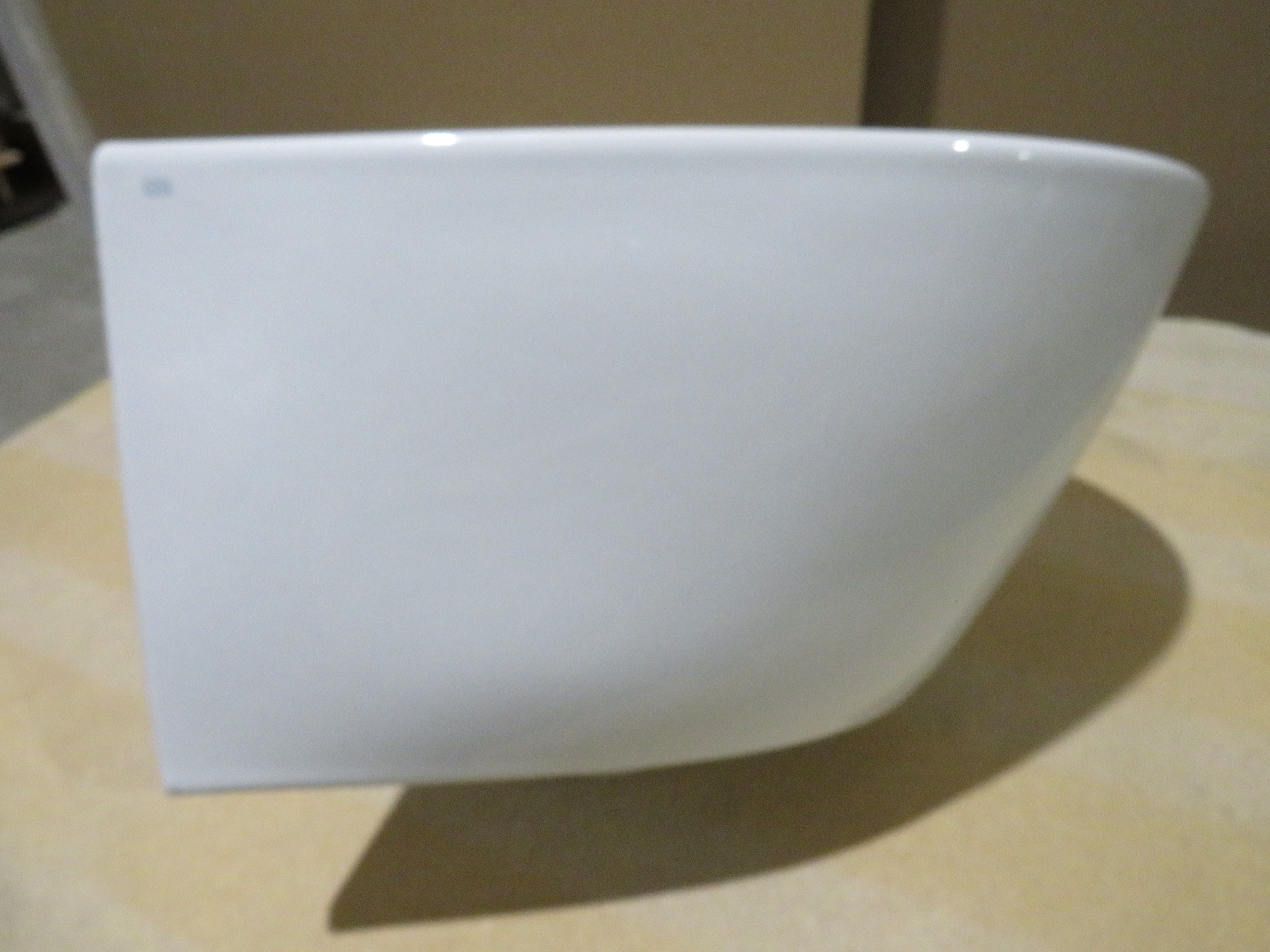 УЦЕНКА. Унитаз подвесной безободковый GSI MODO  981611_УЦ/2   520 мм х 370 мм, белый глянцевый / Дефект: неровность эмали, вкючение.