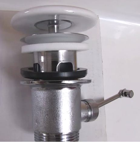 Донный клапан  автоматический  для раковин Laufen   8.9818.7.000.000.1 с керамической крышкой.