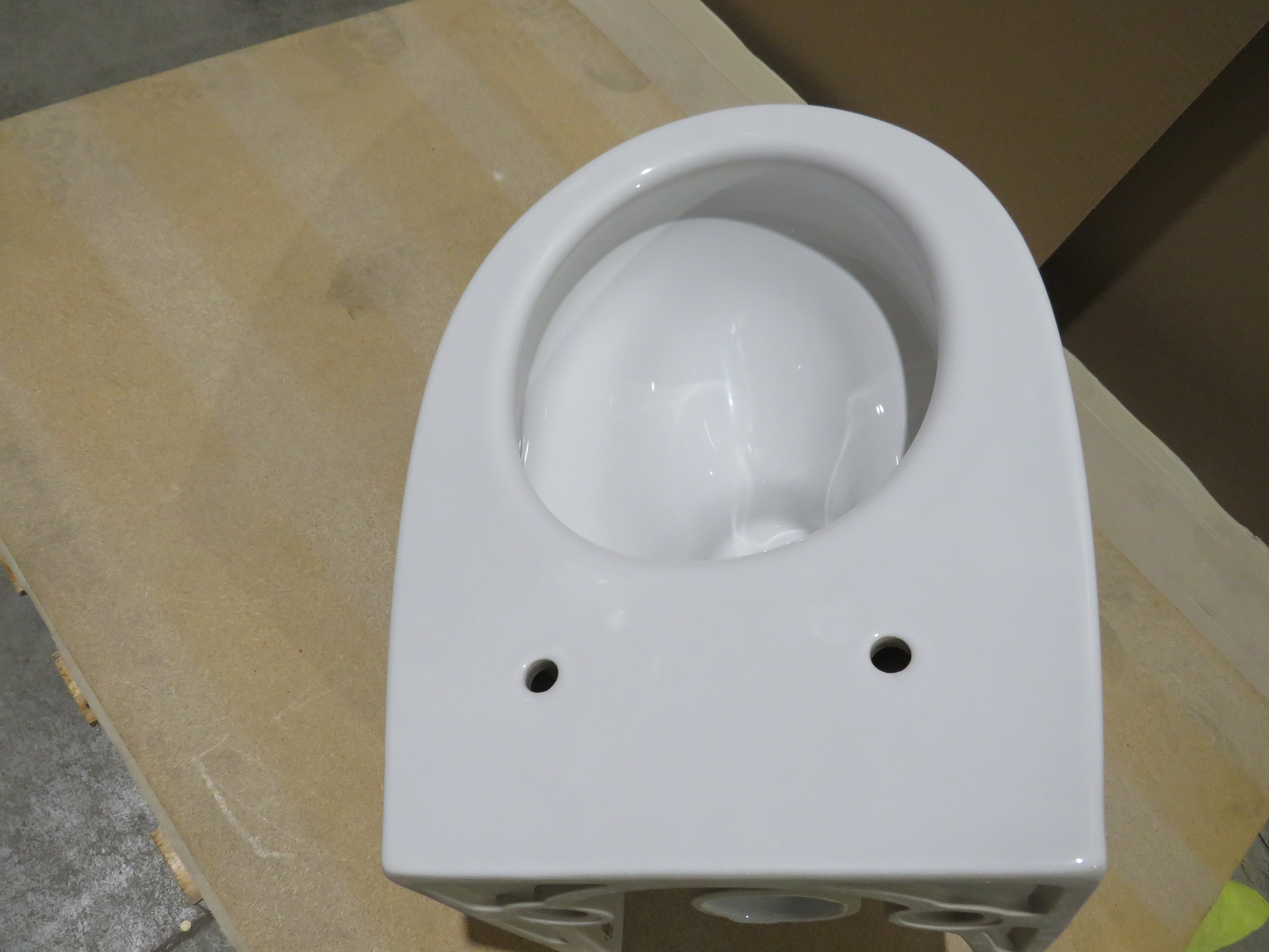 УЦЕНКА. Унитаз подвесной безободковый GSI MODO  981611_УЦ/2   520 мм х 370 мм, белый глянцевый / Дефект: неровность эмали, вкючение.